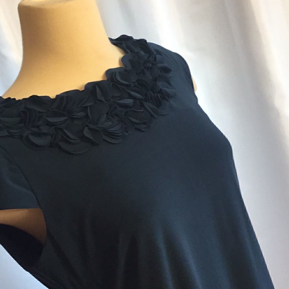 Pull on style dress with flower neckline in size 8